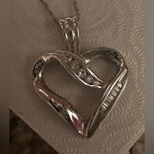 Heart necklace with 4 small diamonds, stamped 10k